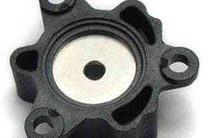 Metal Insert Molded Valve Component.